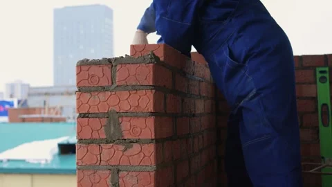 Bricklayer Hard at Work Ongoing Construction of a Residential Building Structure Stock Footage 305855990