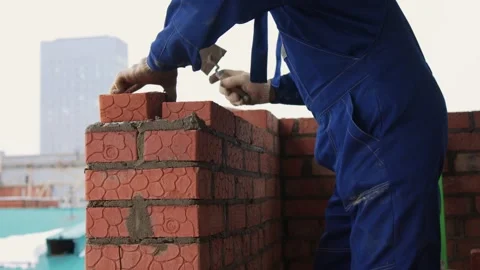 Bricklayer Hard at Work Ongoing Construction of a Residential Building Structure Stock Footage 305856027