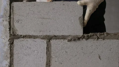 Bricklayer Hard at Work Ongoing Construction of a Residential Building Structure Stock Footage 308036500