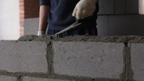 Bricklayer Hard at Work Ongoing Construction of a Residential Building Structure Stock Footage 308036503