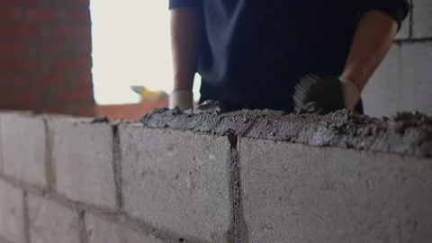 Bricklayer Hard at Work Ongoing Construction of a Residential Building Structure Stock Footage 308036597
