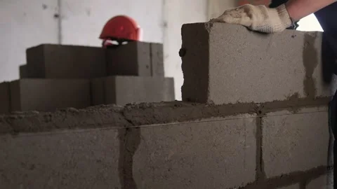 Bricklayer Hard at Work Ongoing Construction of a Residential Building Structure Stock Footage 308036919