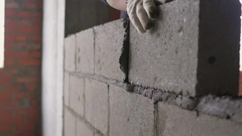 Bricklayer Hard at Work Ongoing Construction of a Residential Building Structure Stock Footage 308036925