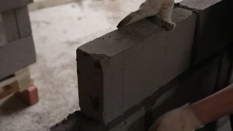 Bricklayer Hard at Work Ongoing Construction of a Residential Building Structure Stock Footage 308036980