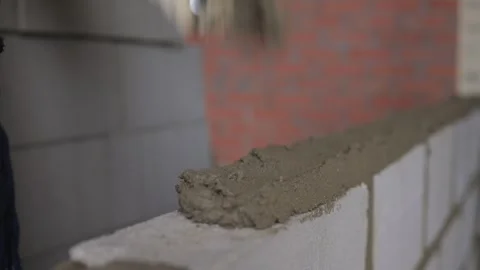 Bricklayer Hard at Work Ongoing Construction of a Residential Building Structure Stock Footage 308037011