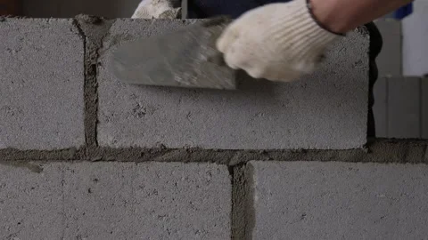 Bricklayer Hard at Work Ongoing Construction of a Residential Building Structure Stock Footage 308037016