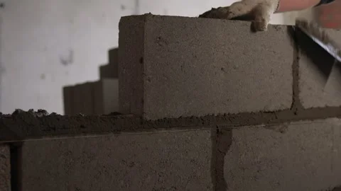 Bricklayer Hard at Work Ongoing Construction of a Residential Building Structure Stock Footage 308037046