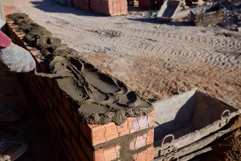 Bricklayer Hard at Work Ongoing Construction of a Residential Building Structure Stock Photos