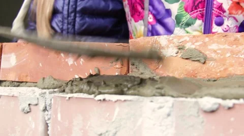 A bricklayer putting bricks being very concentrated Video stock 68807009