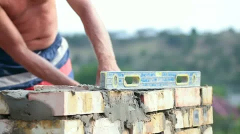 Bricklayer at work Stock Footage 22222291