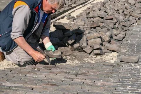 Bricklayer at work Stock Photos