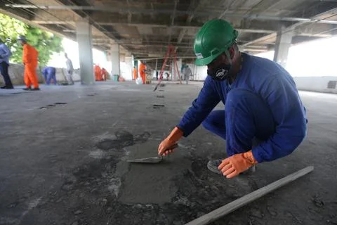 Bricklayer working on construction Stock Photos