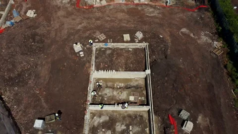 Bricklayers Building Foundations On Building Site Stock Footage 239758501