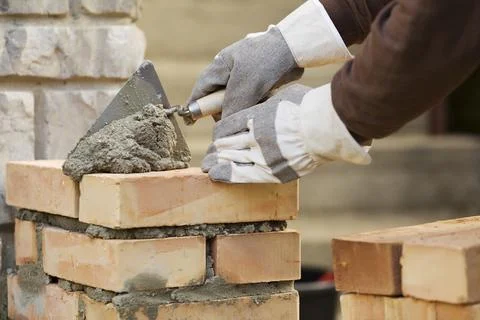 Bricklaying brick wall Foto stock