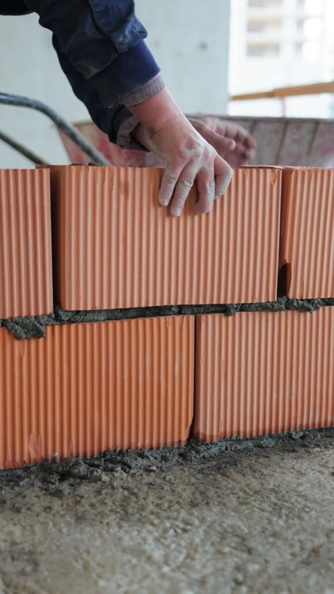 Bricklaying Close-Up: Adding Red Brick to Wall Stock Footage 271586744