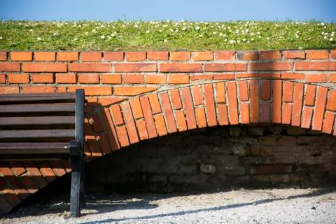 Bricks and bench Stock Photos
