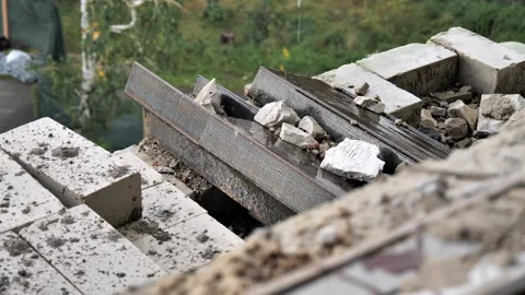 Bricks and metal structures ready for use lie on a construction site close-up Stock Footage 217374785