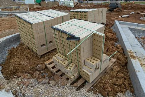 Bricks and Other Construction Materials At Commercial Building Site Foto stock