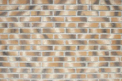 Bricks and plaster on stone wall, construction and architecture, protection Stock Photos