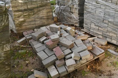 The bricks are lying on the ground Stock Photos