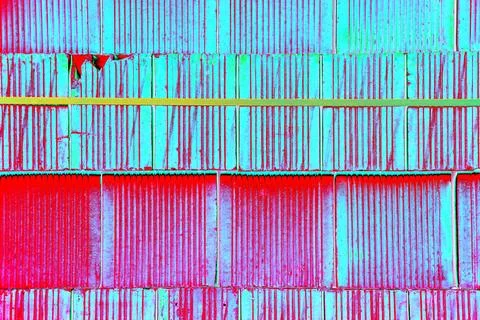 Bricks are stacked in a cube, stack for construction, brick background. Cha.. Stock Photos