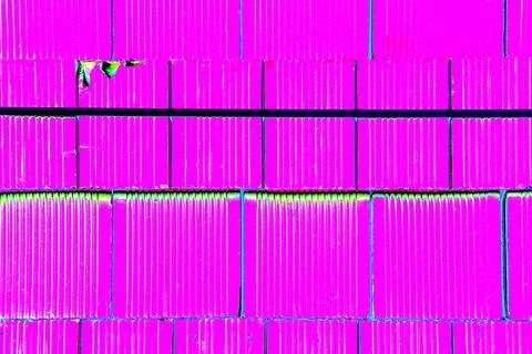 Bricks are stacked in a cube, stack for construction, brick background. Cha.. Stock Photos