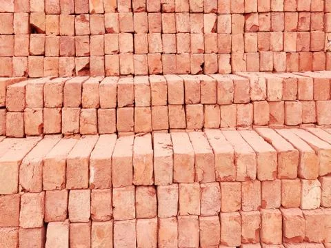 Bricks arranged in row for house construction Stock Photos