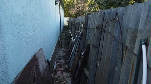 Bricks. Backyard. Household garbage. Village. 스톡 동영상 116896432