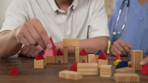 Bricks being built by trembling hands Stock Footage 204790242