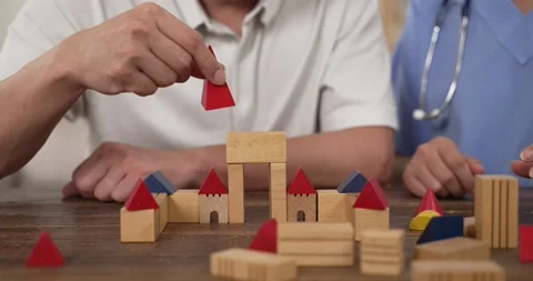 Bricks being built by trembling hands Video stock 220021153