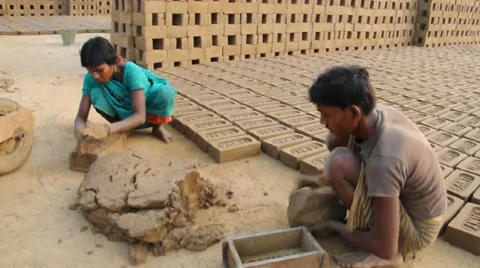 Bricks being made at an indian brickfield Stock Footage 38869784