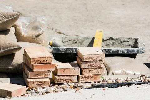Bricks, cement, sand and construction materials Stock Photos