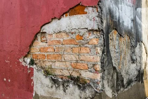Bricks of a cracked wall. Stock Photos
