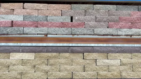 Bricks falling down in slow motion from shelf in warehouse Stock Footage 314131928