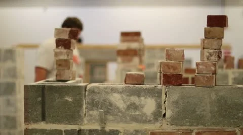 Bricks in foreground mason DOF Stock-Footage 10703135