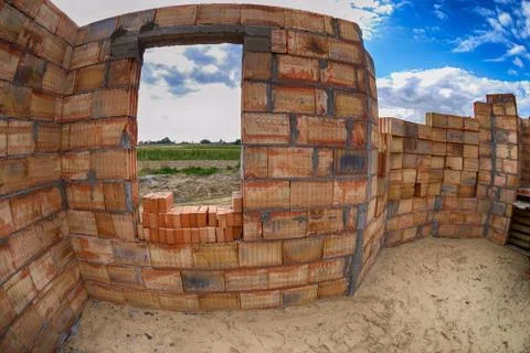 Bricks at house construction site Stock Photos