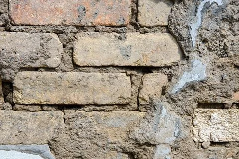 Bricks in the old building wall. Stock Photos