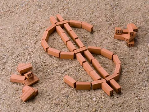 Bricks on sand, forming the dollar symbol Stock Photos