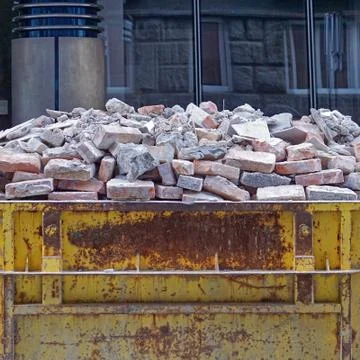 Bricks in skip Stock Photos