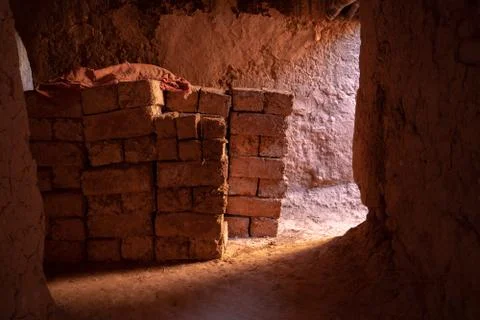 Bricks stacked in old cave Stock Photos