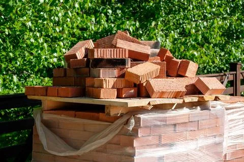 Bricks in the summer at a construction site. Block on the street 写真素材