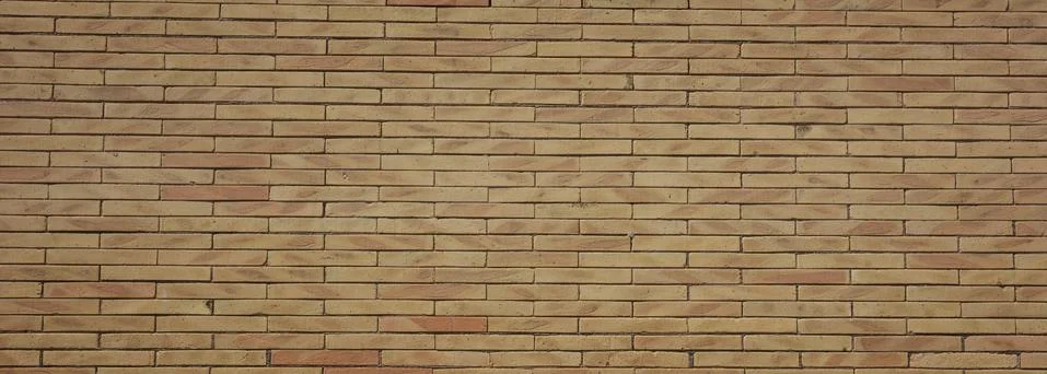 Bricks wall background texture, beige, yellow color, cement, clay. Vintage wa Stock Photos