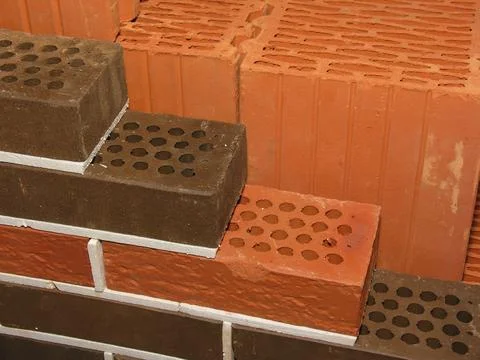 Bricks wall with steps Stock Photos