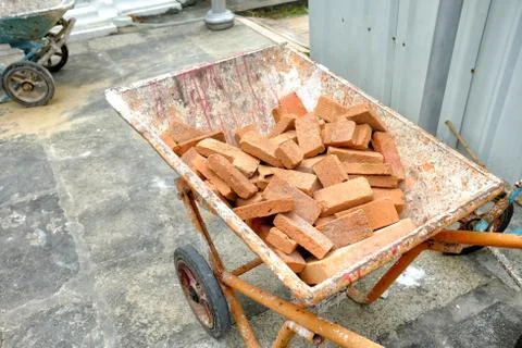 Bricks in Wheelbarrow. Stock Photos