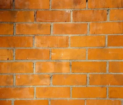 Brickwall pattern texture in orange color Foto stock