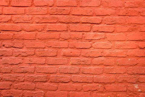 Brickwall with red plaster Stock Photos