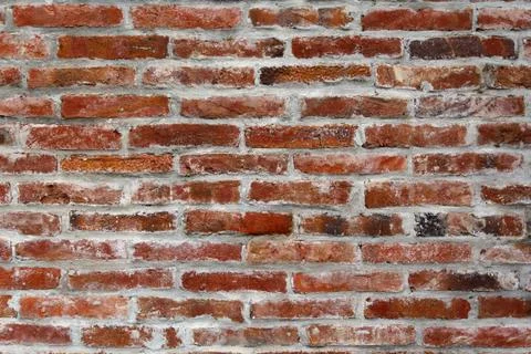 Brickwork and gray mortar. Backgrounds and textures Stock Photos