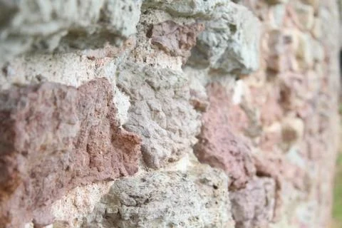 Brickwork, a beautiful wall. Interesting stone background. Stock Photos