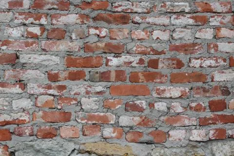 Brickwork, a beautiful wall. Interesting stone background. Stock Photos