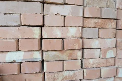 Brickwork of brick, folded in a certain way and fixed with mortar. industrial Stock Photos